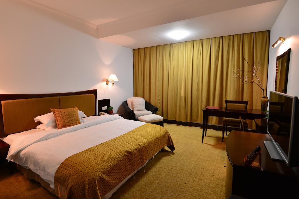 Baodao Exhibition Center Hotel Vujisan Szoba fotó