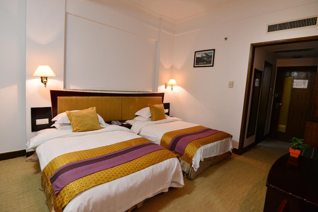 Baodao Exhibition Center Hotel Vujisan Szoba fotó