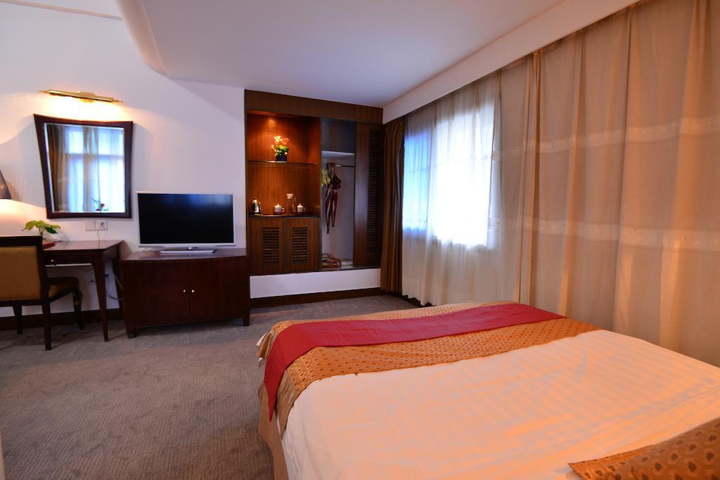 Baodao Exhibition Center Hotel Vujisan Szoba fotó